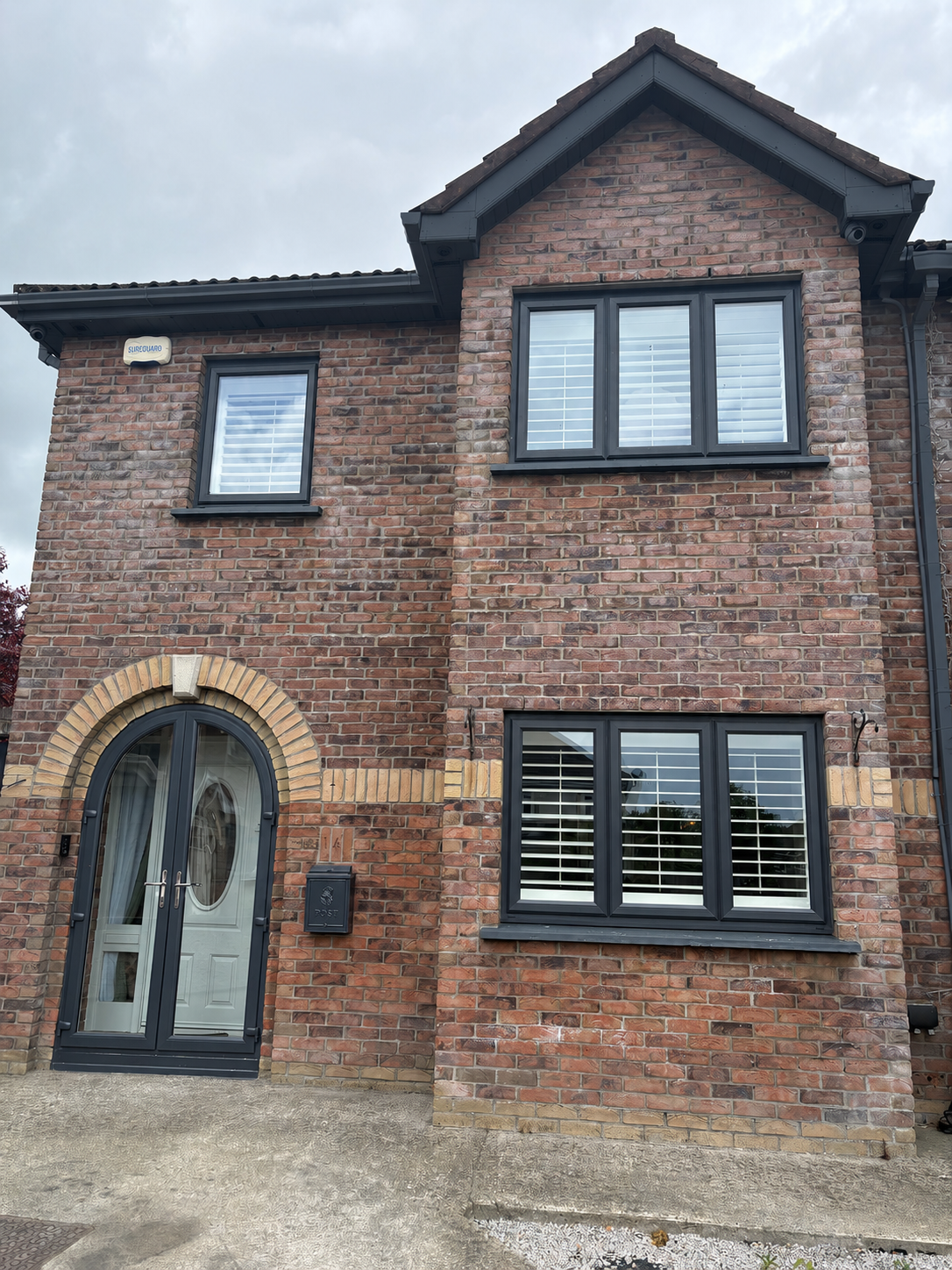 Full exterior respray — windows, doors, soffit & fascia